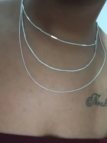 Anel ajustável prateado com detalhe em leque e pedras brilhantes