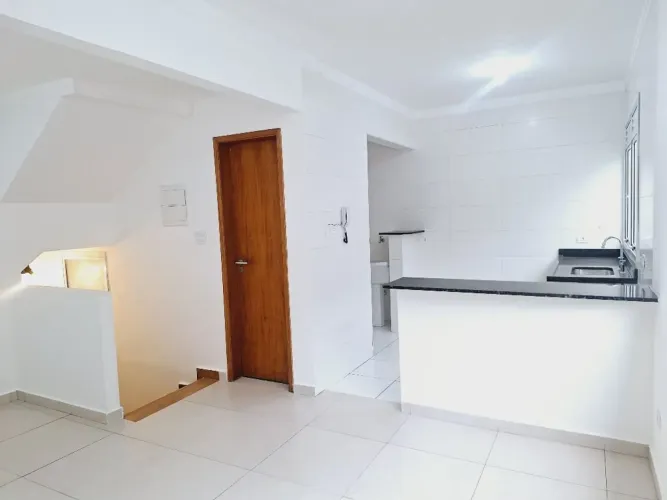 Casa duplex em Villagio para locação em Santos com 2 suítes e garagem privativa
