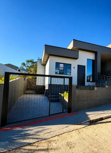 Casa geminada 59m² NOVA, pé direito 4 metros, 2 dormitórios, PALHOÇA bela vista
