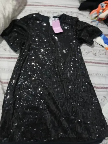 Vestidos de 10 a 12 anos por 250 e mais 46 peças de roupa