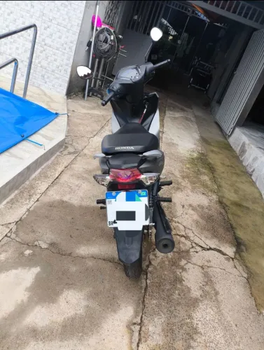 Honda biz pouco  km