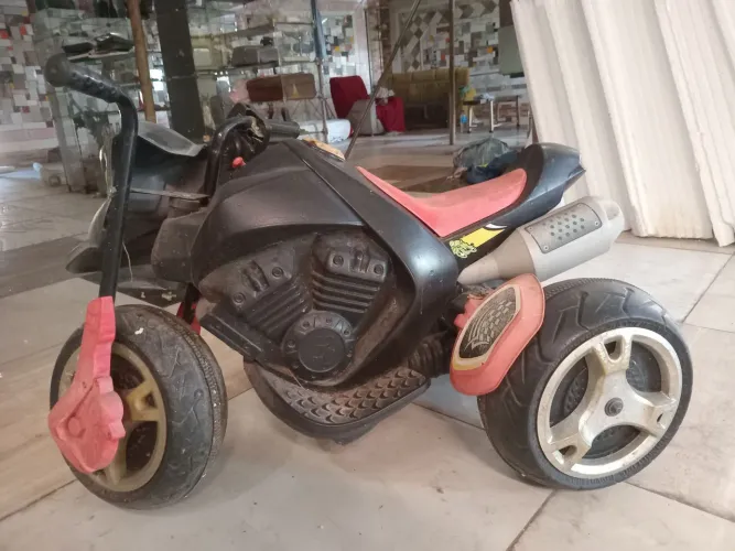 Moto a bateria  brinquedo pra criança 