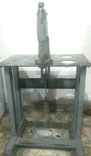 Máquina de ilhos