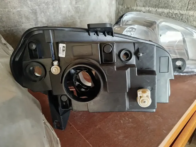Par de lentes do farol do Novo Uno 