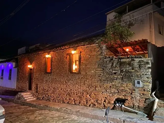 Casa histórica de pedra, imóvel comercial em São Thomé das Letras
