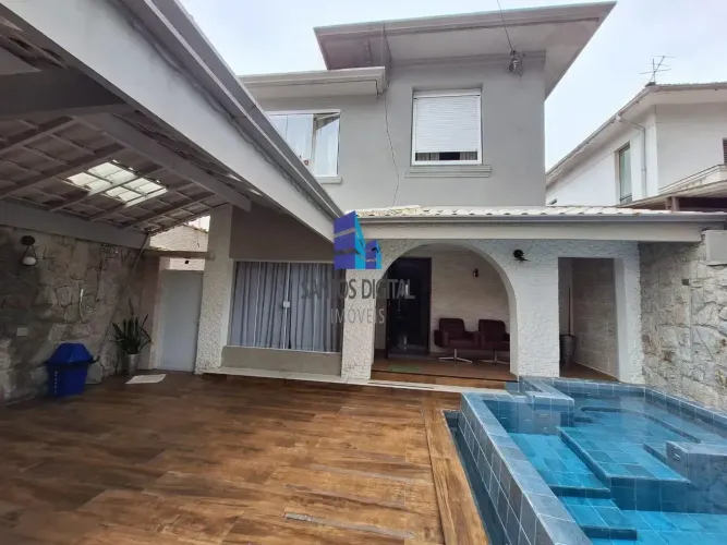 Casa com Piscina venda possui 230m² com 5 quartos em Boqueirão - Santos - SP