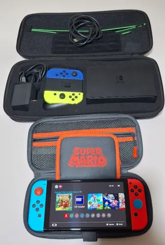 Nintendo Switch Oled Desbloqueado Impecável Case extra grande + case normal + Joycon extra