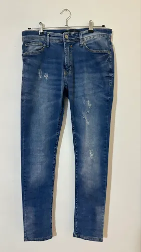calça jeans masculina skinny renner com rasgos tamanho 38