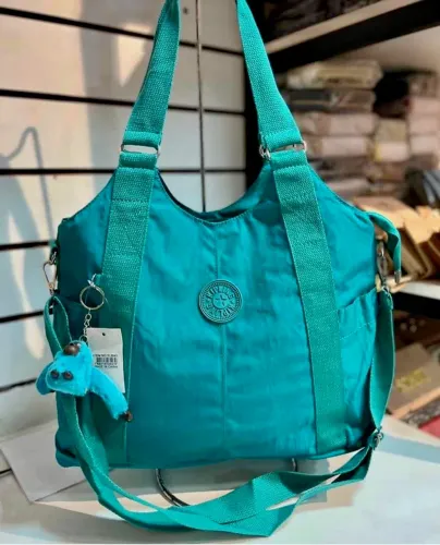 Bolsa inspiração Kipling verde água 