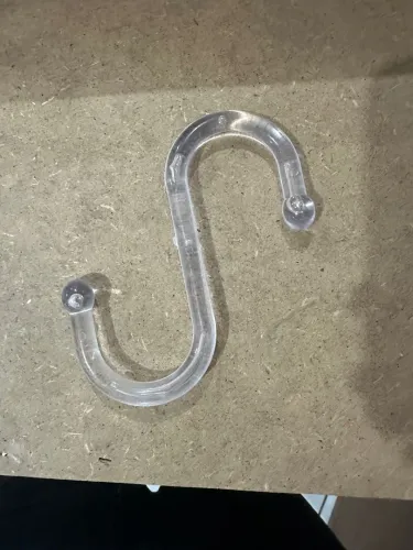 Gancho de plástico transparente para colocar calça jeans 