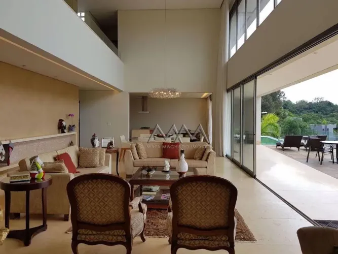 Casa à Venda no Condomínio Quintas do Sol com 4 Suítes  450m²
