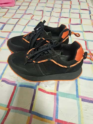 Tenis Homem do sapato golden shopping  usei poucas vezes praticamente novo 