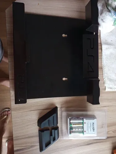 Vendo suporte ps4 e carregador de pilha 