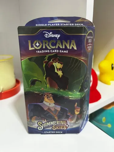 Disney Lorcana - Starter Dek Shimmering Skies - Scar e Kronk