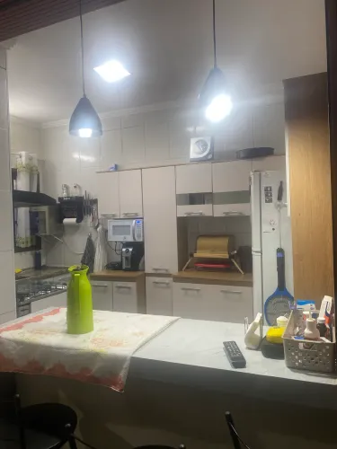 Casa com edícula a venda