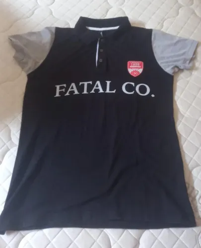 Camiseta Gola Polo Tamanho M seminova.