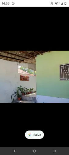 Vendo terreno com três casas
