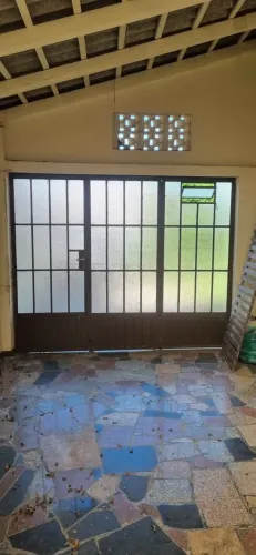 Vendo porta de garagem de ferro