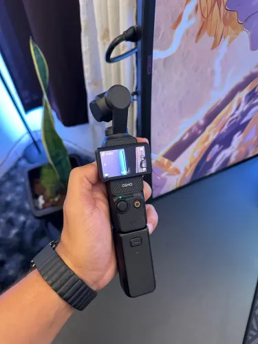 Câmera osmo pocket 3 combo creator 1 ano de uso  