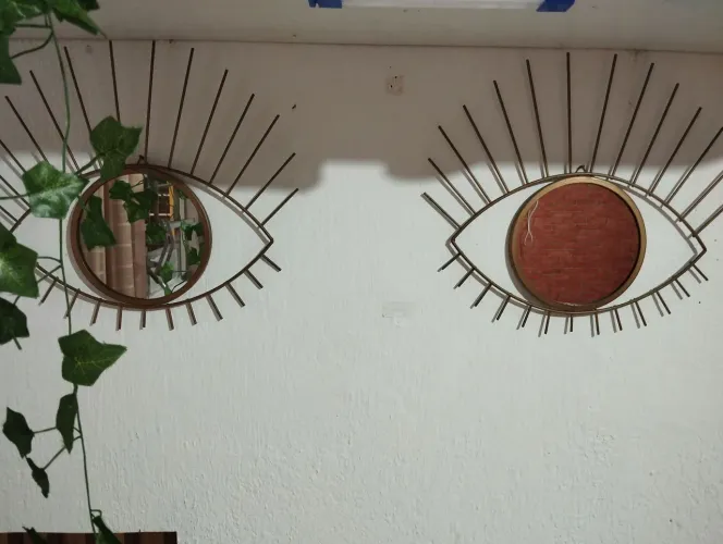 Par de olhos decorativos metal e espelho