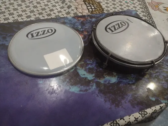 Divido no cartão . Tamborim Izzo + Baqueta + pele nova para tamborim.