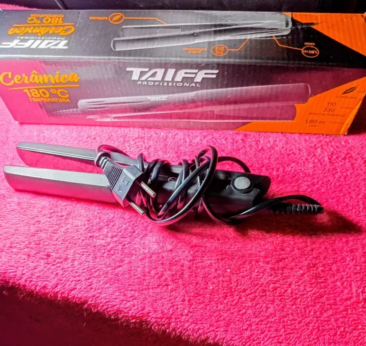 Prancha Taiff 180grsus bivolt  Cerâmica preta R$ 230,O0 