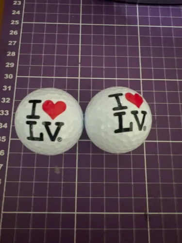 Vendo 2 bolas de golfe colecionável de souvenir