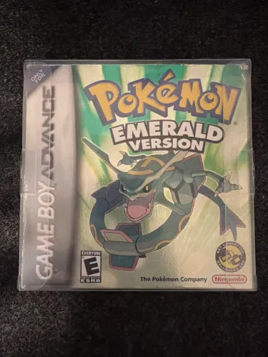 Pokémon Emerald Version - caixa com manual e shield