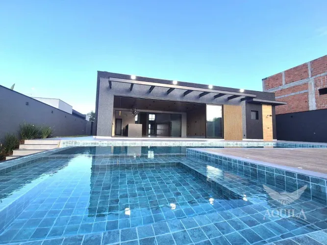 CASA TÉRREA NOVA COM 4 SUÍTES - CINEMA - PISCINA - ESPAÇO GOURMET - 06 VAGAS - CONDOMÍNIO