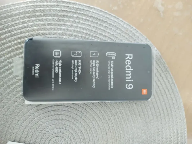 Celular redimi 9, novo $600