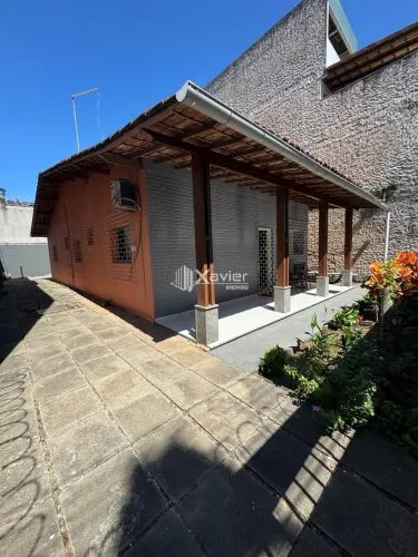 Casa à venda na Praia do Morro em Guarapari/ES com 3 quartos, 2 suítes, garagem para 5 car