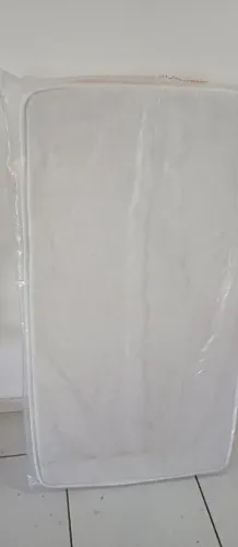 Colchão de berço novo ainda no plástico