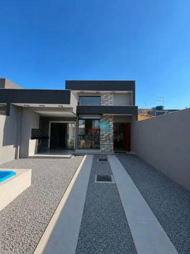 Casa com 3 dormitórios à venda, 105 m² por R$ 650.000 - Village Rio das Ostras - Rio das O