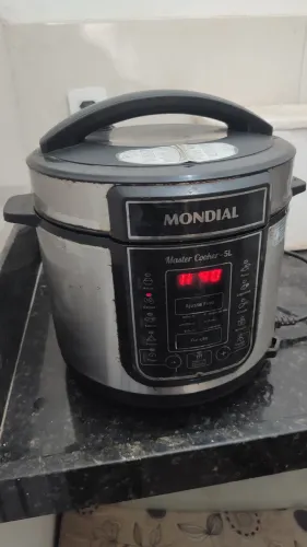 Vendo panela de pressão mondial elétrica 5L 127v 900w funciona perfeitamente leia.
