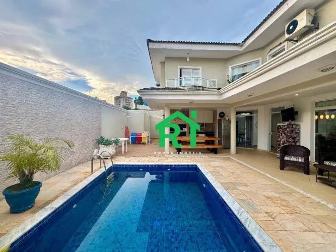 Casa com 3 quartos (1 suíte), 4 vagas e lazer à venda no Tombo, Guarujá | Rocha Imóveis Gu