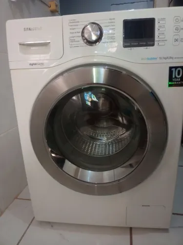 Lava e seca Samsung 10,1kg /6kg funcionando perfeitamente sem ferrugem a máquina está imp