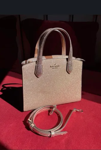 Bolsa dourada Kate Spade nunca usada