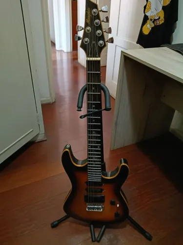 Guitarra Memphis By Tagima pouco usada com suporte de chão 