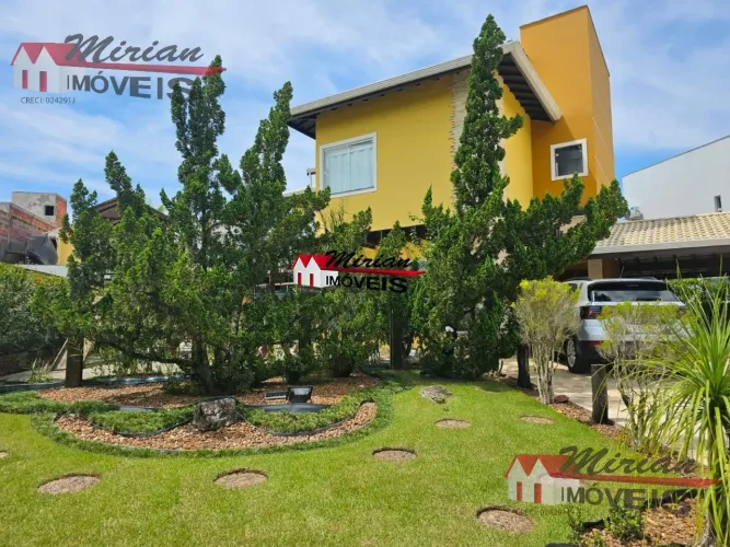 sobrado a venda em condominio fechado com 3 suites em 2 lotes a venda otimo acabamento