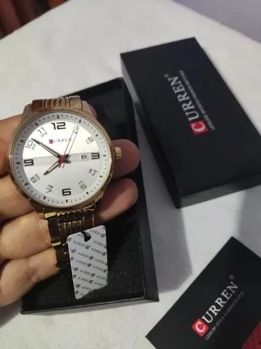 Relógio curen dourado