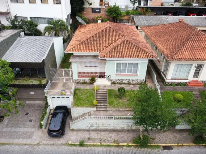 INBOX CIA IMOBILIÁRIA VENDE - Terreno com casa no Centro de Bento Gonçalves.