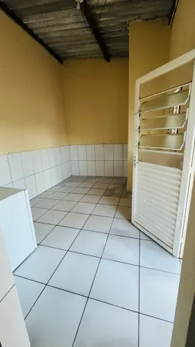 Vendo terreno com duas casas