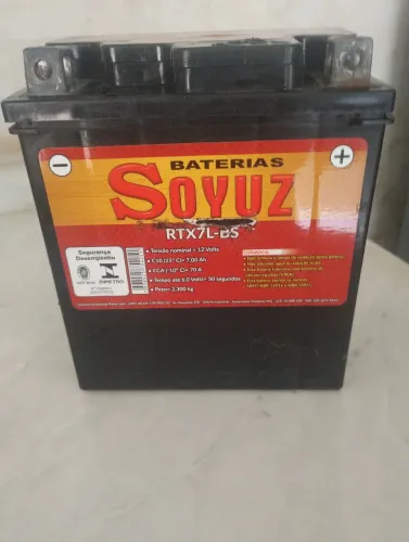 Bateria para moto 7 amperes funcionando perfeitamente valor 100 reais