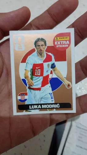 Figurinha mbappe Gold e modric bronze