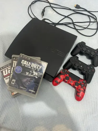 Vendo ps3 slim desbloqueado com 10 jogos