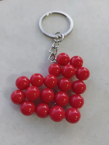 Chaveiro de miçanga artesanal, coração e estrela