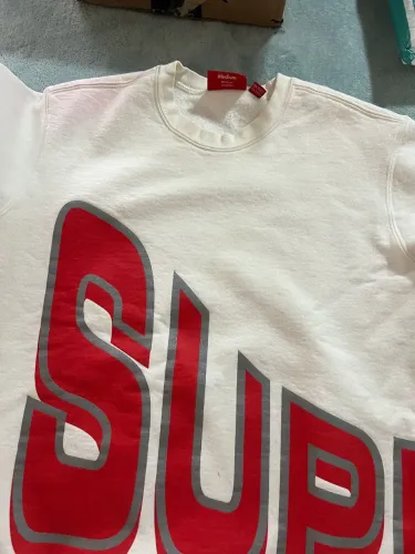 moletom supreme side arc crewneck