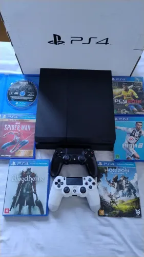 Ps4 fat 850gb,dois controles originais,cabos e 6 com caixa jogos