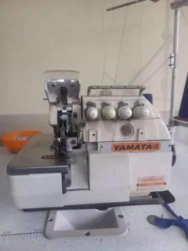 Máquina de costura industrial overloque ponto cadeia