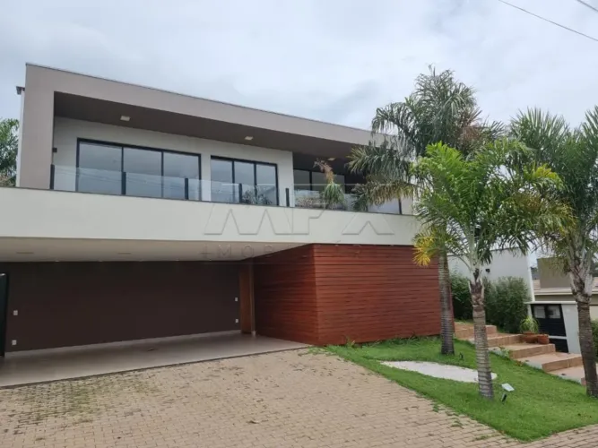 EXCELENTE RESIDÊNCIA COM MUITA ÁREA VERDE E ESPAÇO GOURMET EM UM DOS MELHORES CONDOMINIOS